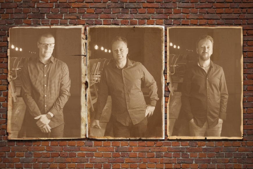 Three images of the members of Cavrn resident band Rodimus separately mounted on a brick wall