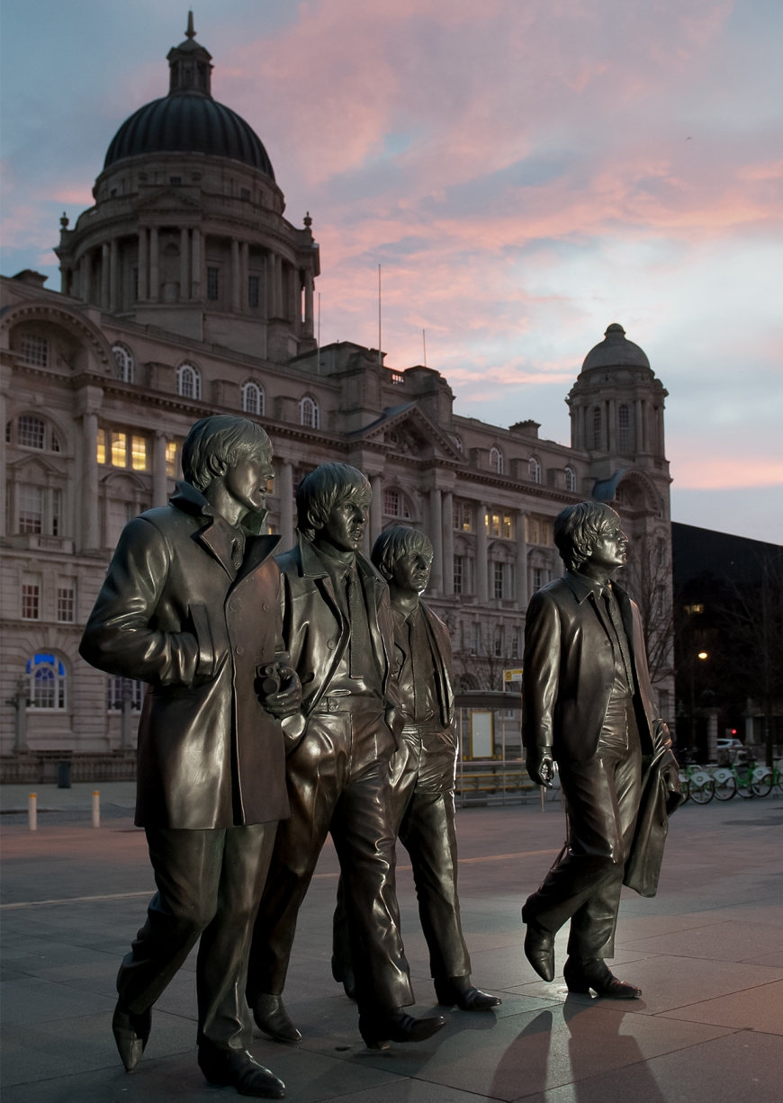 Poster image of the bronze statue of the beatles outside the liver buildings in liverpool