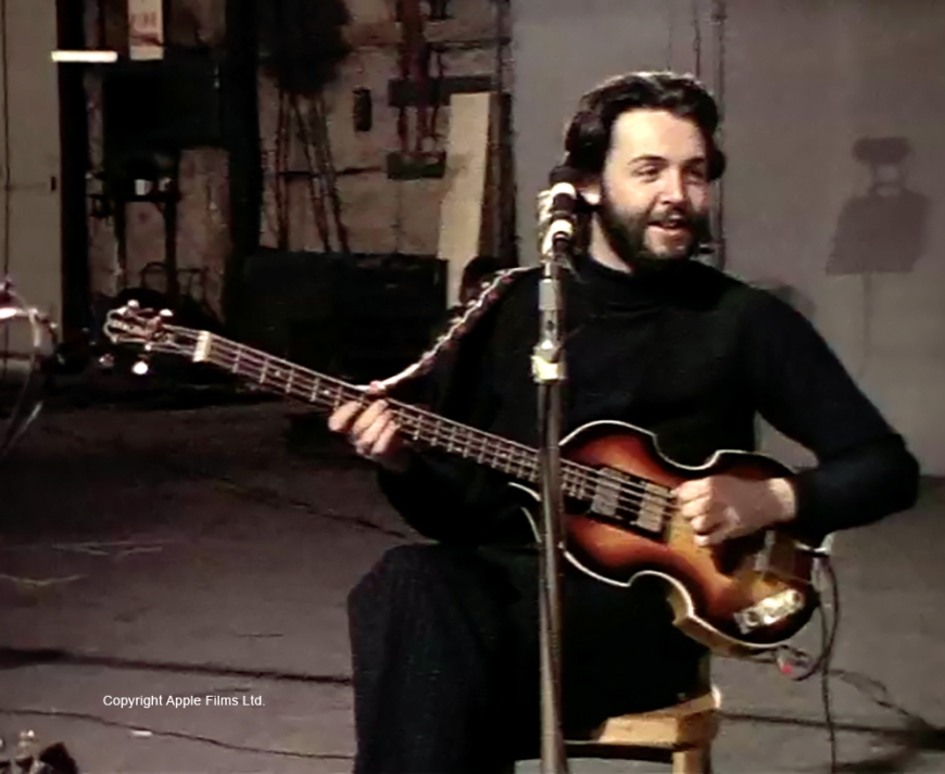 Paul McCartney posing with his hofner violin bass.